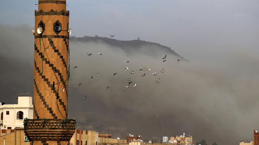 Smoke billows following an airstrike by Saudi-led coalition in the Yemeni capital Sanaa, on June 16, 2020. - Yemen is wracked by a war which has killed tens of thousands of people and led to the world's worst humanitarian crisis, according to the United Nations.
The war between Huthi rebels and pro-government forces escalated in 2015 when a Saudi-led military coalition intervened against the rebels who control large parts of Yemen including the capital Sanaa. (Photo by MOHAMMED HUWAIS / AFP) (Photo by MOHAM