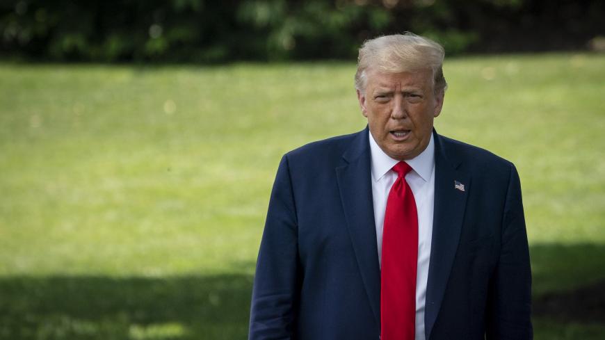 WASHINGTON, DC - JULY 15: U.S. President Donald Trump exits the Oval Office and walks toward Marine One on the South Lawn of the White House on July 15, 2020 in Washington, DC. The President is traveling to the Atlanta, Georgia area to visit the UPS Hapeville Airport Hub and deliver remarks on infrastructure. (Photo by Drew Angerer/Getty Images)