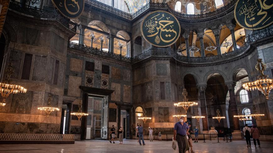 ISTANBUL, TURKEY - JULY 02: Tourists visit Istanbul's famous Hagia Sophia on July 02, 2020 in Istanbul, Turkey. Turkey's Council of State will begin a review today of the building's status and the possibility of changing it from a museum, back into a mosque upon the request of nationalist and religious groups. Throughout it's history the UNESCO World Heritage site has served as a Byzantine Cathedral, a mosque under Ottoman rule and now a museum, after a 1934 decision led by modern Turkey's founder Mustafa K