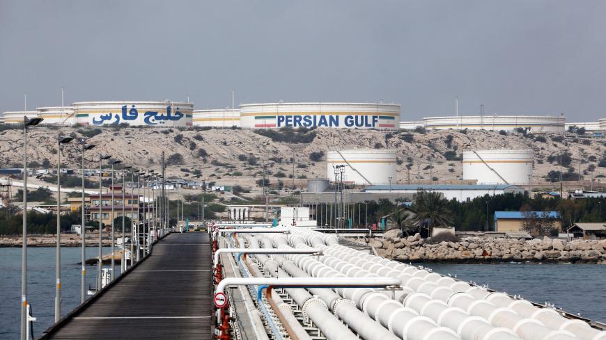 A picture taken on March 12, 2017, shows a view of an oil facility in the Khark Island, on the shore of the Gulf. / AFP PHOTO / ATTA KENARE        (Photo credit should read ATTA KENARE/AFP via Getty Images)