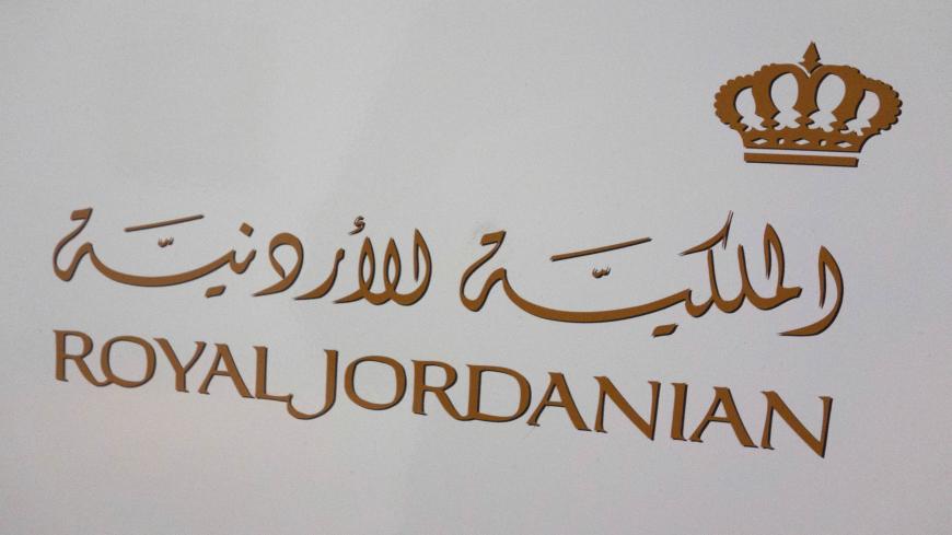A sign marks directions to the check-in for Royal Jordanian Airlines on March 21, 2017 at John F. Kennedy International Airport in New York. 
Passengers traveling to the United States from 10 airports in eight Muslim-majority countries will be prohibited from bringing laptops, tablets and other portable electronic devices on board with them when they fly. The nine airlines affected by the US ban are Royal Jordanian, EgyptAir, Turkish Airlines, Saudi Arabian Airlines, Kuwait Airways, Royal Air Maroc, Qatar A