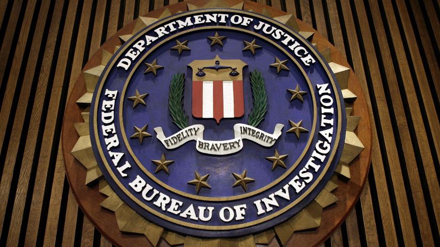 WASHINGTON - MARCH 09:  The seal of the F.B.I. hangs in the Flag Room at the bureau's headquaters March 9, 2007 in Washington, DC. F.B.I. Director Robert Mueller was responding to a report by the Justice Department inspector general that concluded the FBI had committed 22 violations in its collection of information through the use of national security letters. The letters, which the audit numbered at 47,000 in 2005, allow the agency to collect information like telephone, banking and e-mail records without a