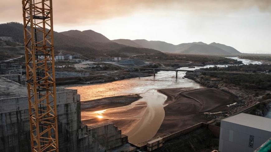 A general view of the Blue Nile river as it passes through the Grand Ethiopian Renaissance Dam (GERD),  near Guba in Ethiopia, on December 26, 2019. - The Grand Ethiopian Renaissance Dam, a 145-metre-high, 1.8-kilometre-long concrete colossus is set to become the largest hydropower plant in Africa.
Across Ethiopia, poor farmers and rich businessmen alike eagerly await the more than 6,000 megawatts of electricity officials say it will ultimately provide. 
Yet as thousands of workers toil day and night to fin