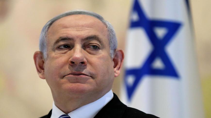 TOPSHOT - Israeli Prime Minister Benjamin Netanyahu attends a cabinet meeting of the new government at Chagall State Hall in the Knesset (Israeli parliament) in Jerusalem on May 24, 2020. (Photo by ABIR SULTAN / POOL / AFP) (Photo by ABIR SULTAN/POOL/AFP via Getty Images)