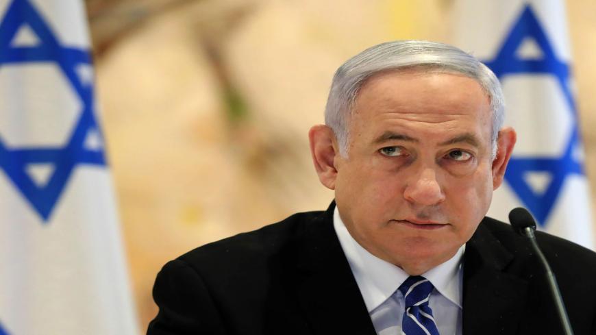 Israeli Prime Minister Benjamin Netanyahu attends a cabinet meeting of the new government at Chagall State Hall in the Knesset (Israeli parliament) in Jerusalem on May 24, 2020. (Photo by ABIR SULTAN / POOL / AFP) (Photo by ABIR SULTAN/POOL/AFP via Getty Images)
