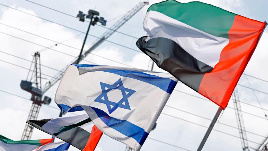 Israeli and United Arab Emirates flags line a road in the Israeli coastal city of Netanya, on August 16, 2020. (Photo by JACK GUEZ / AFP) (Photo by JACK GUEZ/AFP via Getty Images)