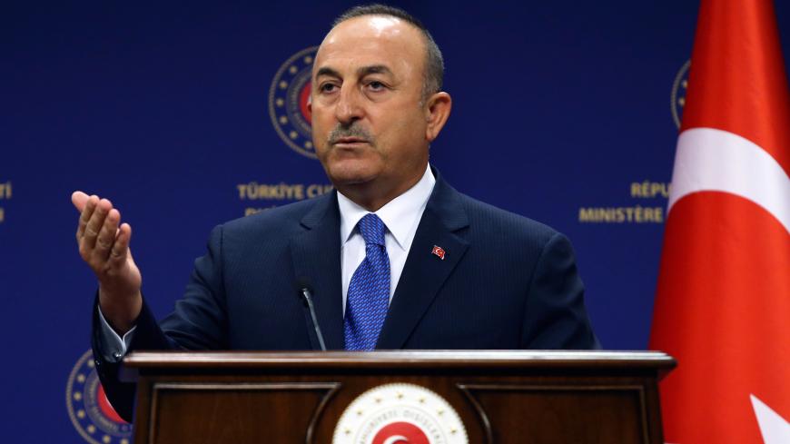 Turkish Foreign Affairs Minister Mevlut Cavusoglu holds a joint press conference with the German Foreign Affairs minister following their meeting at the Turkish Foreign Ministry in Ankara on August 25, 2020. - The German Foreign minister warned on August 25 that Turkey's standoff with Greece in the eastern Mediterranean was at a "very critical" juncture but stressed that both sides appeared ready to talk. A crisis has been brewing in the eastern Mediterranean, where Turkey is at odds with Greece and the Eur