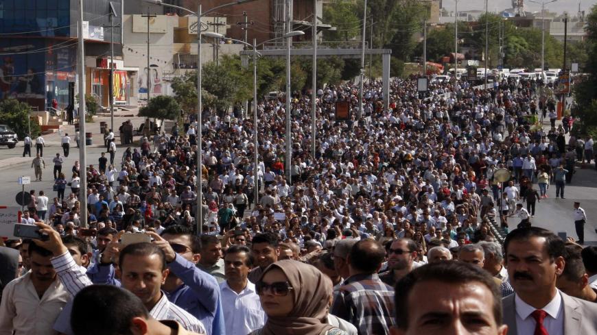 Iraqi Kurds take part in a  mass demonstration in the city of Sulaymaniyah to demand payment of their salaries and an end to corruption, on September 27, 2016.  / AFP / SHWAN MOHAMMED        (Photo credit should read SHWAN MOHAMMED/AFP via Getty Images)
