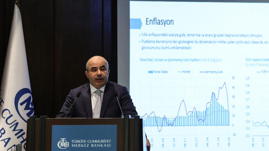 Governor of Central Bank of the Republic of Turkey (CBRT), Murat Uysal presents the Inflation Report during a press conference, in Ankara, on July 31, 2019. (Photo by Adem ALTAN / AFP)        (Photo credit should read ADEM ALTAN/AFP via Getty Images)