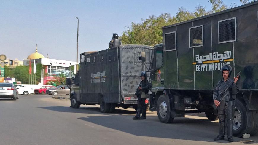 Egyptian riot police stand guard in Egypt's capital Cairo on September 27, 2019. - Egypt's President dismissed today a call for a second weekend of protests as "no reason for concern", with hundreds already arrested in an intensifying crackdown on a rare show of discontent on the streets. (Photo by Khaled DESOUKI / AFP) (Photo credit should read KHALED DESOUKI/AFP via Getty Images)