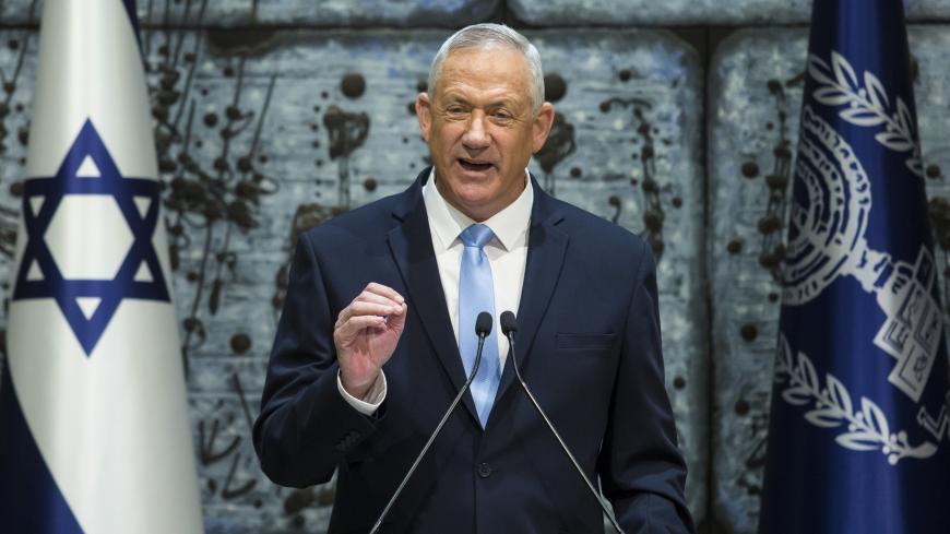 Benny Gantz (C), A former IDF Chief and the head of Israeli Resilience party speaks to supporters during an election campaign event in Tel Aviv. Israelis will vote in a parliamentary election on April 9, choosing among party lists of candidates to serve in the 121-seat Knesset
