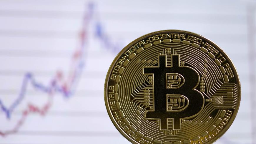 The photo shows a physical imitation of a Bitcoin in Dortmund, western Germany, on January 27, 2020. (Photo by INA FASSBENDER / AFP) (Photo by INA FASSBENDER/AFP via Getty Images)