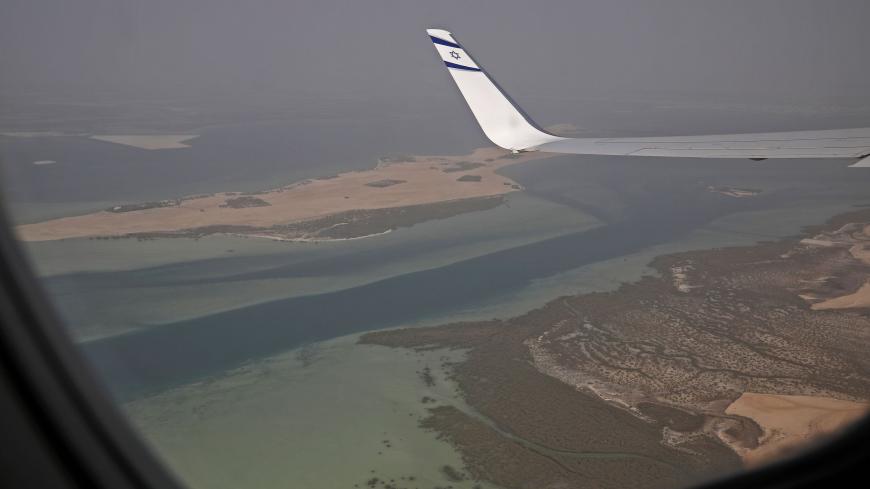 A picture taken on August 31, 2020, shows a view from the window of the the El Al's flight LY971, which will carry the delegation from Tel Aviv to Abu Dhabi, ahead of landing at the Abu Dhabi airport. - A US-Israeli delegation including White House advisor Jared Kushner took off on a historic first direct commercial flight from Tel Aviv to Abu Dhabi to mark the normalisation of ties between the Jewish state and the UAE. (Photo by NIR ELIAS / POOL / AFP) (Photo by NIR ELIAS/POOL/AFP via Getty Images)