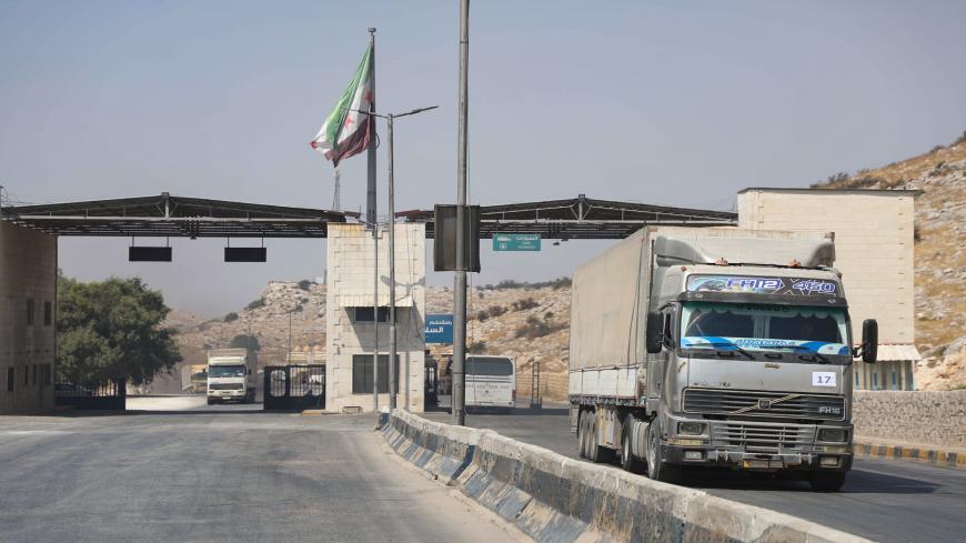 International humanitarian aid trucks cross into Syria's northwestern Idlib province through the Bab al-Hawa border crossing with Turkey, on September 7, 2020. (Photo by AAREF WATAD / AFP) (Photo by AAREF WATAD/AFP via Getty Images)