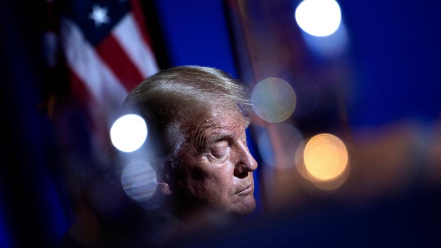 TOPSHOT - US President Donald Trump waits to speak at a roundtable rally with Latino supporters at the Arizona Grand Resort and Spa in Phoenix, Arizona on September 14, 2020. (Photo by Brendan Smialowski / AFP) (Photo by BRENDAN SMIALOWSKI/AFP via Getty Images)