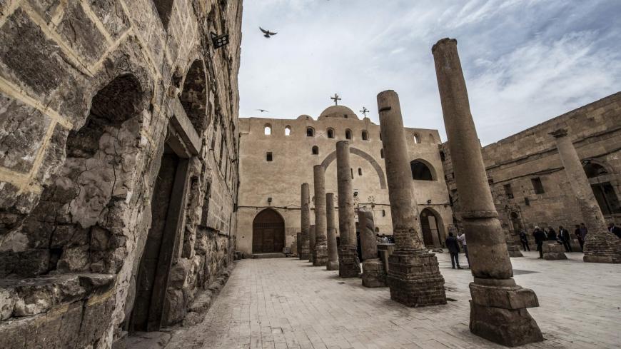This picture taken on April 6, 2019 shows a view of a courtyard in the Coptic Orthodox "White Monastery" of St Shenouda (Schenute) the Archimandrite in Egypt's southern Sohag province, about 500 kilometres south of the capital Cairo. - Dating back to the second half of the 5th century AD, the monastery is named name for the colour of its white limestone outside walls. It is architecturally similar to the nearby "Red Monastery". (Photo by Khaled DESOUKI / AFP) (Photo credit should read KHALED DESOUKI/