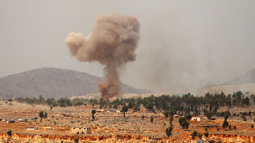 Smoke billows from a reported Russian airstrike near the village of Hafsarjah, in the western countryside of Idlib province in northwestern Syria, on September 11, 2020. (Photo by Abdulaziz KETAZ / AFP) (Photo by ABDULAZIZ KETAZ/AFP via Getty Images)