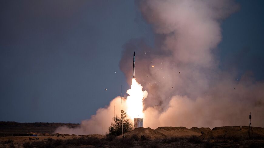 A rocket launches from a S-400 missile system at the Ashuluk military base in Southern Russia on September 22, 2020 during the "Caucasus-2020" military drills gathering China, Iran, Pakistan and Myanmar troops, along with ex-Soviet Armenia, Azerbaijan and Belarus. - Up to 250 tanks and around 450 infantry combat vehicles and armoured personnel carriers will take part in the September 21 to 26 land and naval exercises that will involve 80,000 people including support staff. (Photo by Dimitar DILKOFF / AFP) (