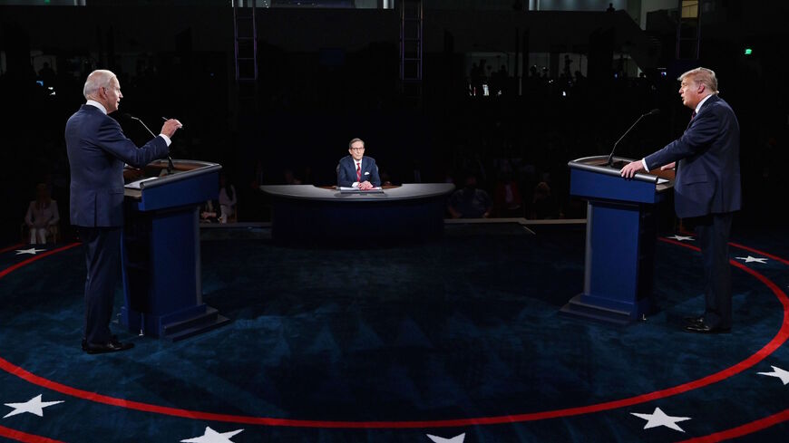 US President Donald Trump (R) and Democratic presidential candidate Joe Biden participate in the first presidential debate at the Health Education Campus of Case Western Reserve University on September 29, 2020 in Cleveland, Ohio. - Biden said on October 2, 2020, he has tested negative for Covid-19, three days after his debate with Trump, who has contracted the illness. Trump's positive diagnosis was announced in the early hours of Friday after one of his senior aides, Hope Hicks, tested positive. (Photo by