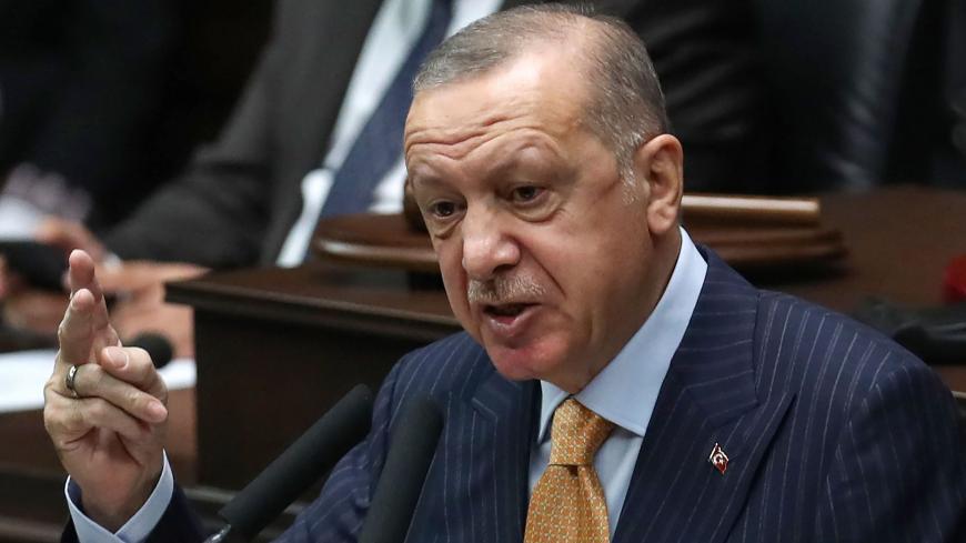 Turkish President and leader of the Justice and Development Party (AK Party) Recep Tayyip Erdogan addresses his party's group meeting at the Turkish Grand National Assembly in Ankara, on October 28, 2020. (Photo by Adem ALTAN / AFP) (Photo by ADEM ALTAN/AFP via Getty Images)