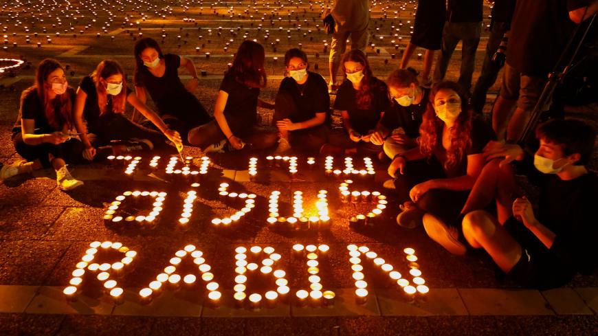 Israelis light 25,000 candles at Rabin Square in the Israeli coastal city Tel Aviv, on October 29, 2020, ahead of the 25th anniversary of the assassination of former Israeli Prime Minister Yitzhak Rabin, - Rabin was gunned down in Tel Aviv after a peace rally on November 4, 1995 by a right-wing Jewish extremist Yigal Amir. (Photo by JACK GUEZ / AFP) (Photo by JACK GUEZ/AFP via Getty Images)