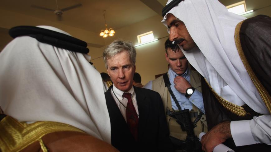 RAMADI, IRAQ - SEPTEMBER 06: U.S. ambassador Ryan Crocker speaks to tribal leaders during a key development meeting between Iraqi and American government officials and Sunni sheikhs September 6, 2007 in Ramadi, Anbar Province, Iraq. Crocker speaks fluent Arabic. He and commanding General David Petraeus are due to give a report to Congress next week on the state of the war in Iraq. (Photo by John Moore/Getty Images)