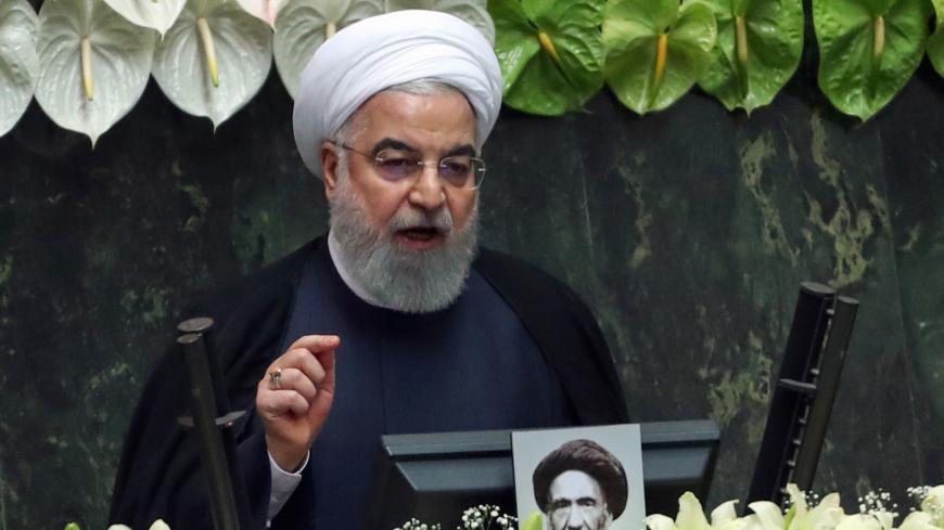 Iranian President Hassan Rouhani delivers a speech during the inaugural session of the new parliament following February elections, in Tehran on May 27, 2020. - The 11th legislature since the Islamic revolution of 1979 opened as the country's economy, which has been hard hit by the novel coronavirus, gradually returns to normal. Rouhani, who is in the final year of his second and final term, called on MPs, collectively and individually, to place the "national interest above special interests", "party intere