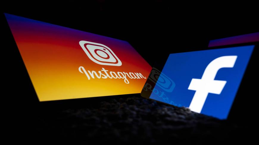 This picture taken on October 5, 2020 in Toulouse, southwestern France, shows logos of US social networks Facebook and Instagram on the screens of a tablet and a mobile phone. (Photo by Lionel BONAVENTURE / AFP) (Photo by LIONEL BONAVENTURE/AFP via Getty Images)