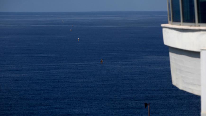A picture taken on October 12, 2020, shows maritime border markers near the Rosh Hanikra Crossing, also known as the Ras Al Naqoura Crossing, between Israel and Lebanon. - On October 1, Lebanon and Israel, which are still technically at war, said they had agreed to begin UN-brokered negotiations over the shared frontier, in what Washington hailed a "historic" agreement, with a tentative date set for the discussions for October 14, which would be confirmed, according to a US envoy. (Photo by JALAA MAREY / AF