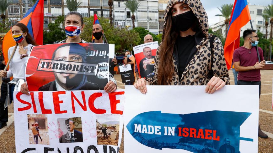 Members of the Armenian community in Israel hold banners in the coastal city of Tel Aviv on November 6, 2020, as they protest against Israel's arms sales to Azerbaijan and Turkey's support to the latter. - Israeli media say that Israel's Elbit Systems has sold Azerbaijan armed drones, which have shifted the military balance in the decades-old dispute in Nagorno-Karabakh
Armenia in October recalled its ambassador from Israel in protest at its weapons sales to Baku. (Photo by JACK GUEZ / AFP) (Photo by JACK G