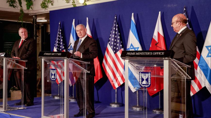 (L to R) US Secretary of State Mike Pompeo, Israeli Prime Minister Benjamin Netanyahu, and Bahrain's Foreign Minister Abdullatif bin Rashid Al Zayani give a press conference after their trilateral meeting in Jerusalem on November 18, 2020. (Photo by Menahem KAHANA / POOL / AFP) (Photo by MENAHEM KAHANA/POOL/AFP via Getty Images)