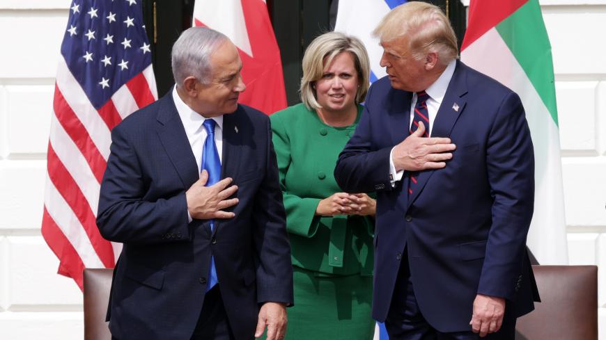 WASHINGTON, DC - SEPTEMBER 15:  Prime Minister of Israel Benjamin Netanyahu and U.S. President Donald Trump participate in the signing ceremony of the Abraham Accords on the South Lawn of the White House on September 15, 2020 in Washington, DC. Witnessed by President Trump, Prime Minister Netanyahu signed a peace deal with the UAE and a declaration of intent to make peace with Bahrain. (Photo by Alex Wong/Getty Images)