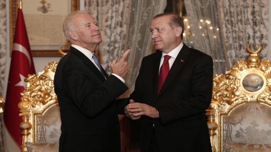 US Vice President Joe Biden (L) gestures next to Turkish President Recep Tayyip Erdogan after a meeting at Yildiz Mabeyn Palace on January 23, 2016 in Istanbul.  / AFP / POOL / SEDAT SUNA        (Photo credit should read SEDAT SUNA/AFP via Getty Images)