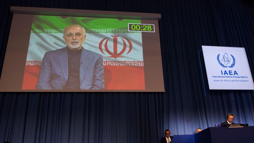 Rafael Grossi (R), Director General of the International Atomic Energy Agency (IAEA), listens to Iran's Atomic Energy Vice-President Ali Akbar Salehi, who attends virtually the 64th General Conference of the IAEA at the agency's headquarters in Vienna, Austria on September 21, 2020. (Photo by JOE KLAMAR / AFP) / The erroneous mention[s] appearing in the metadata of this photo by JOE KLAMAR has been modified in AFP systems in the following manner: [Ali Akbar Salehi] instead of [Zarif]. Please immediately rem