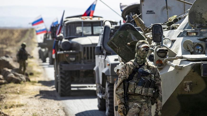 A Russian Military convoy drives near the village of Ein Diwar in Syria's northeastern Hasakeh province on October 11, 2020. (Photo by Delil SOULEIMAN / AFP) (Photo by DELIL SOULEIMAN/AFP via Getty Images)