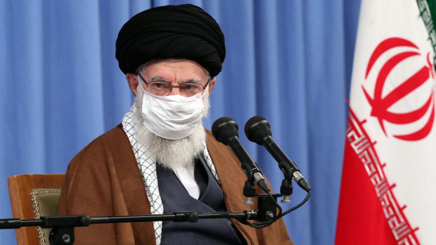 A handout picture provided by the office of Iran's Supreme Leader Ayatollah Ali Khamenei on October 24, 2020, shows him wearing a protective face mask as he gives a speech in the capital Tehran during a meeting of the national staff to discuss the issue of the novel coronavirus pandemic crisis. (Photo by - / KHAMENEI.IR / AFP) / XGTY / === RESTRICTED TO EDITORIAL USE - MANDATORY CREDIT "AFP PHOTO / HO / KHAMENEI.IR" - NO MARKETING NO ADVERTISING CAMPAIGNS - DISTRIBUTED AS A SERVICE TO CLIENTS === (Photo by 