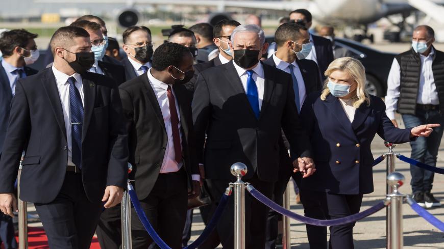 TEL AVIV, ISRAEL - DECEMBER 03: Israeli Prime Minister Benjamin Netanyahu and his wife Sara Netanyahu attend the welcoming ceremony for Ethiopian Jewish Immigrants who arrived on a special flight from Ethiopia at Ben Gurion International Airport on December 3, 2020 in Tel Aviv, Israel. Several hundred members of the Falash Mura community of Ethiopian Jews arrived in Israel as part of ongoing relocation initiative. Ethiopian Israeli activists are pressing the Israeli government to admit more Ethiopian Jews t