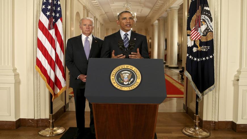 WASHINGTON, DC - JULY 14: President Barack Obama, standing with Vice President Joe Biden, conducts a press conference in the East Room of the White House in response to the Iran Nuclear Deal, on July 14, 2015 in Washington, DC. The landmark deal will limit Iran's nuclear program in exchange for relief from international sanctions. The agreement, which comes after almost two years of diplomacy, has also been praised by Iranian President Hassan Rouhani. (Photo by Andrew Harnik - Pool/Getty Images)