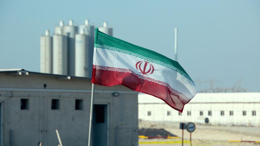 A picture taken on November 10, 2019, shows an Iranian flag in Iran's Bushehr nuclear power plant, during an official ceremony to kick-start works on a second reactor at the facility. - Bushehr is Iran's only nuclear power station and is currently running on imported fuel from Russia that is closely monitored by the UN's International Atomic Energy Agency. (Photo by ATTA KENARE / AFP) (Photo by ATTA KENARE/AFP via Getty Images)