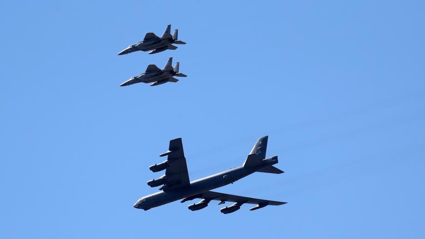 NEW ORLEANS, LOUISIANA - MAY 01: Two B-52 Bombers and two F-15 fighter jets fly over the University Medical Center on May 01, 2020 in New Orleans, Louisiana. The flyover was done as a salute to first responders and hospital workers in some of the hardest hit areas of the coronavirus (COVID-19). (Photo by Chris Graythen/Getty Images)