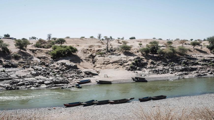 This picture taken in Hamdayet, eastern Sudan, on December 8, 2020 shows abandoned boats on the banks of the river Tekeze which was a known border crossing point for the Ethiopian who fled the Tigray conflict. (Photo by Yasuyoshi CHIBA / AFP) (Photo by YASUYOSHI CHIBA/AFP via Getty Images)