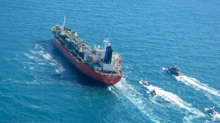A picture obtained by AFP from the Iranian news agency Tasnim on January 4, 2021, shows the South Korean-flagged tanker being escorted by Iran's Revolutionary Guards navy after being seized in the Gulf. - "A Korean ship was seized in Persian Gulf waters by the Revolutionary Guard's navy and transferred to our country's ports," Fars news agency said without naming the vessel. "This tanker had a South Korea flag and was seized over oil pollution and environmental hazards," it added. (Photo by - / TASNIM NEWS 