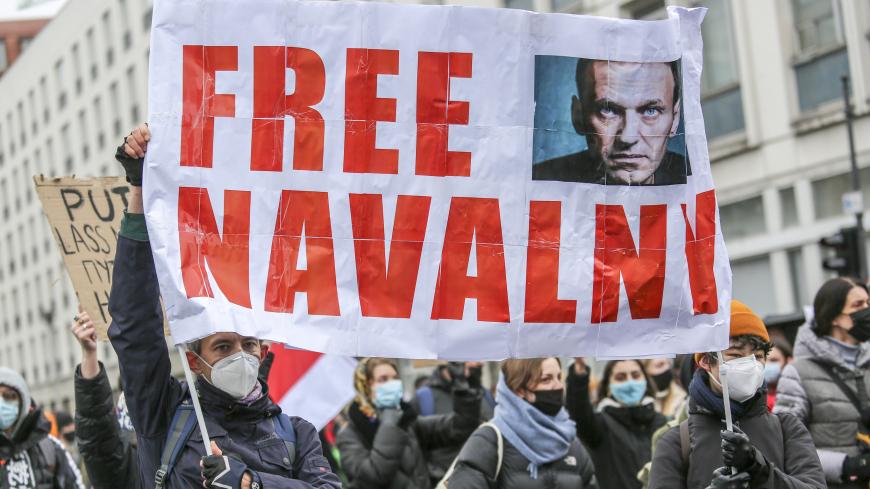 BERLIN, GERMANY - JANUARY 23: Some 2500 supporters of Russian opposition politician Alexei Navalny  marched in protest demand for his release from prison in Moscow on January 23, 2021 in Berlin, Germany. The protesters marched from the federal chancellery through the Russian embassy to Brandenburg Gate in part also heeding a call by Navalny to protest against Russian President Vladimir Putin. Navalny, who was arrested earlier this week upon his return to Moscow from Germany, has called for protests against 