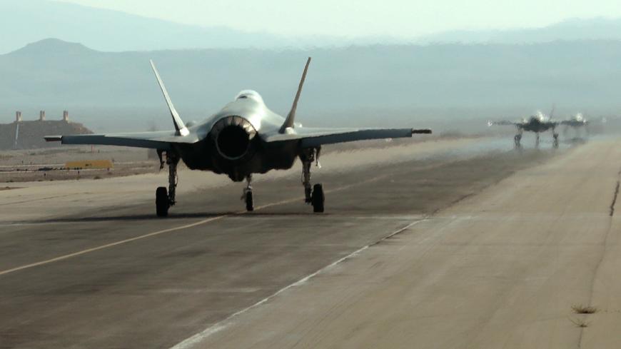 Israeli F-35 fighter jets roll on the tarmac during the "Blue Flag" multinational aerial exercise at the Ovda air force base, north of the Israeli city of Eilat, on November 11, 2019. (Photo by Emmanuel DUNAND / AFP) (Photo by EMMANUEL DUNAND/AFP via Getty Images)