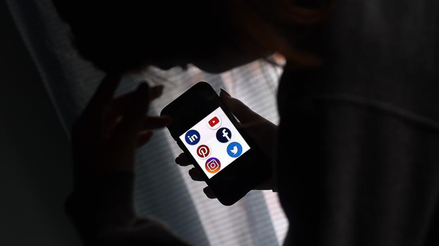 This illustration picture shows social media applications logos from Linkedin, YouTube, Pinterest, Facebook, Instagram and Twitter displayed on a smartphone in Arlington, Virginia on May 28, 2020. - Trump is expected to sign an executive order on May 28, 2020, after threatening to shutter social media platforms following Twitter's move to label two of his tweets misleading. (Photo by Olivier DOULIERY / AFP) (Photo by OLIVIER DOULIERY/AFP via Getty Images)
