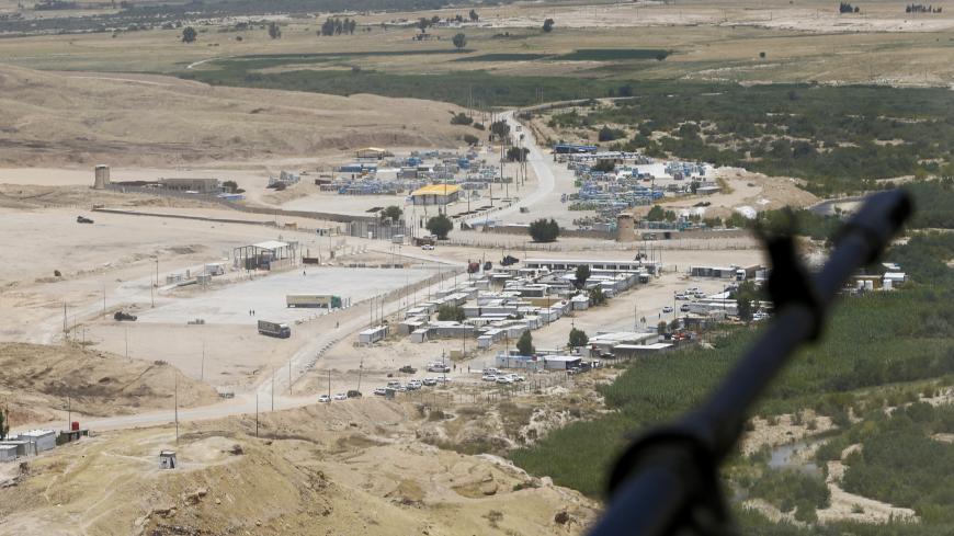 An aerial view shows the Mandili crossing between Iraq and Iran on July 11, 2020. - Iraqi Prime Minister Mustafa al-Kadhemi launched a new campaign against corruption at the country's borders, saying millions of dollars were being lost by not properly taxing imported goods. (Photo by Thaier Al-SUDANI / POOL / AFP) (Photo by THAIER AL-SUDANI/POOL/AFP via Getty Images)