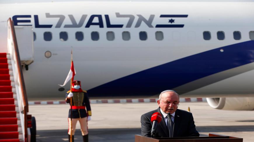 Head of Israel's National Security Council Meir Ben-Shabbat delivers a statement upon his arrival at the Bahraini International Airport on October 18, 2020. - Israel and Bahrain will officially establish diplomatic relations at a ceremony in Manama, an Israeli official said, after the two states reached a US-brokered normalisation deal last month. (Photo by RONEN ZVULUN / POOL / AFP) (Photo by RONEN ZVULUN/POOL/AFP via Getty Images)