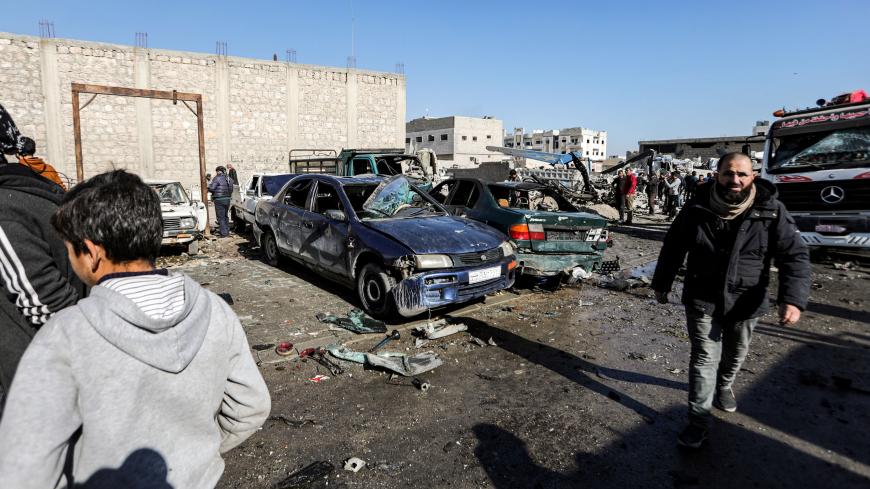 Destroyed vehicles are seen at the scene of a car bomb in the Turkish-controlled town of al-Bab in the north of Syria's Aleppo province on November 24, 2020. - The explosion, which targeted a police station on the outskirts of the town, killed a police chief from another station, two policemen and two civilians, the Britain-based Syrian Observatory for Human Rights reported. (Photo by Bakr ALKASEM / AFP) (Photo by BAKR ALKASEM/AFP via Getty Images)