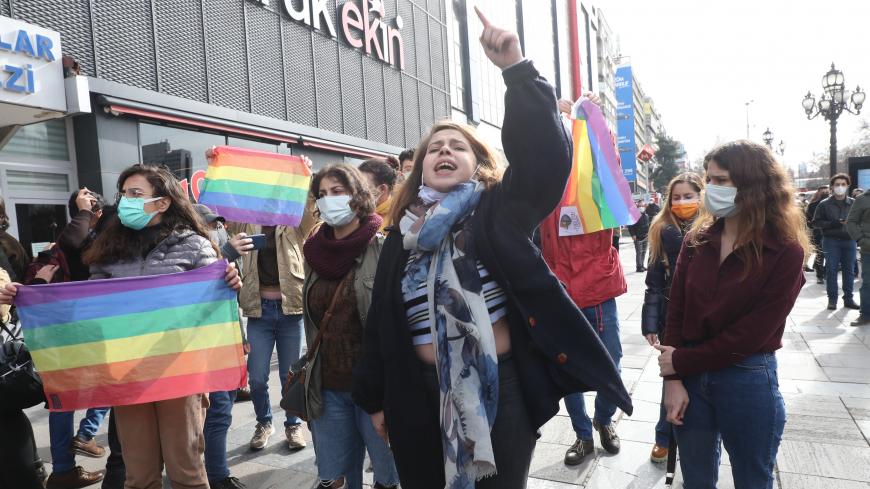 A woman gestures as Turkish Police detain activists supporting Bogazici University students protesting against the appointment by the Turkish government of a new rector in Ankara on February 2, 2021. (Photo by Adem ALTAN / AFP) (Photo by ADEM ALTAN/AFP via Getty Images)