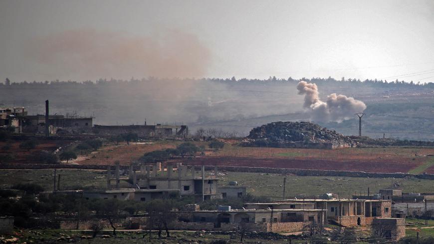 Smoke billows following reported shelling by government forces on the northwestern Syrian town of Barah, in the rebel held Idlib province on February 12, 2021. (Photo by Abdulaziz KETAZ / AFP) (Photo by ABDULAZIZ KETAZ/AFP via Getty Images)
